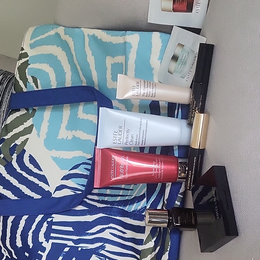 Estee Lauder gift bag and makeup items